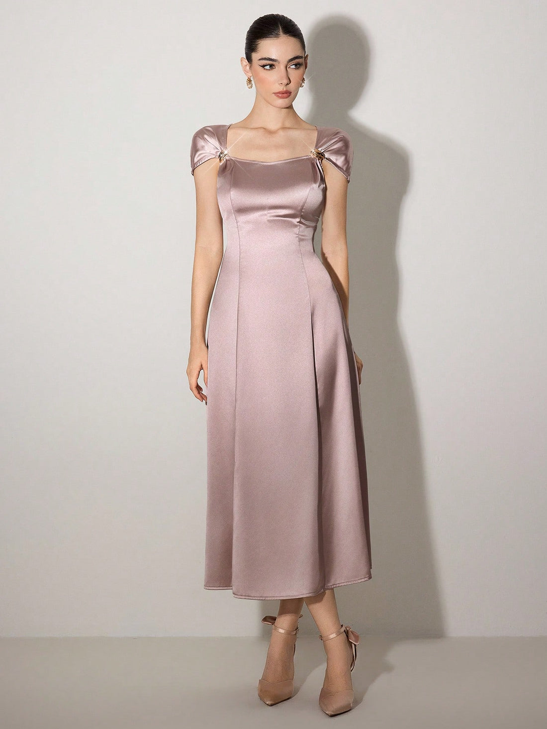 Slip into effortless elegance with this stunning mid-length dress that's your new summer essential. Crafted in a timeless solid color, it strikes the perfect balance between sophisticated and fun—dress it up for brunch or keep it casual for weekend adventures. The flattering silhouette works for any body type, while the versatile hue pairs beautifully with your favorite accessories. Whether you're heading to the office, a garden party, or a casual night out, this wardrobe staple delivers style without the f