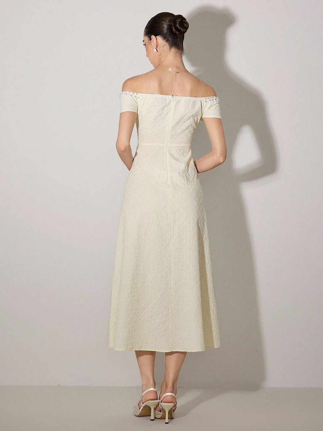Make a statement that's equal parts sophisticated and fun in this stunning one-shoulder fitted dress. The asymmetrical neckline adds instant drama while the tailored silhouette flatters your figure beautifully. Perfect for date nights, cocktail parties, or whenever you want to turn heads with effortless elegance. The mid-length cut strikes that sweet spot between polished and playful—dress it up with heels or keep it casual with sneakers. Because looking chic shouldn't mean sacrificing comfort or personalit