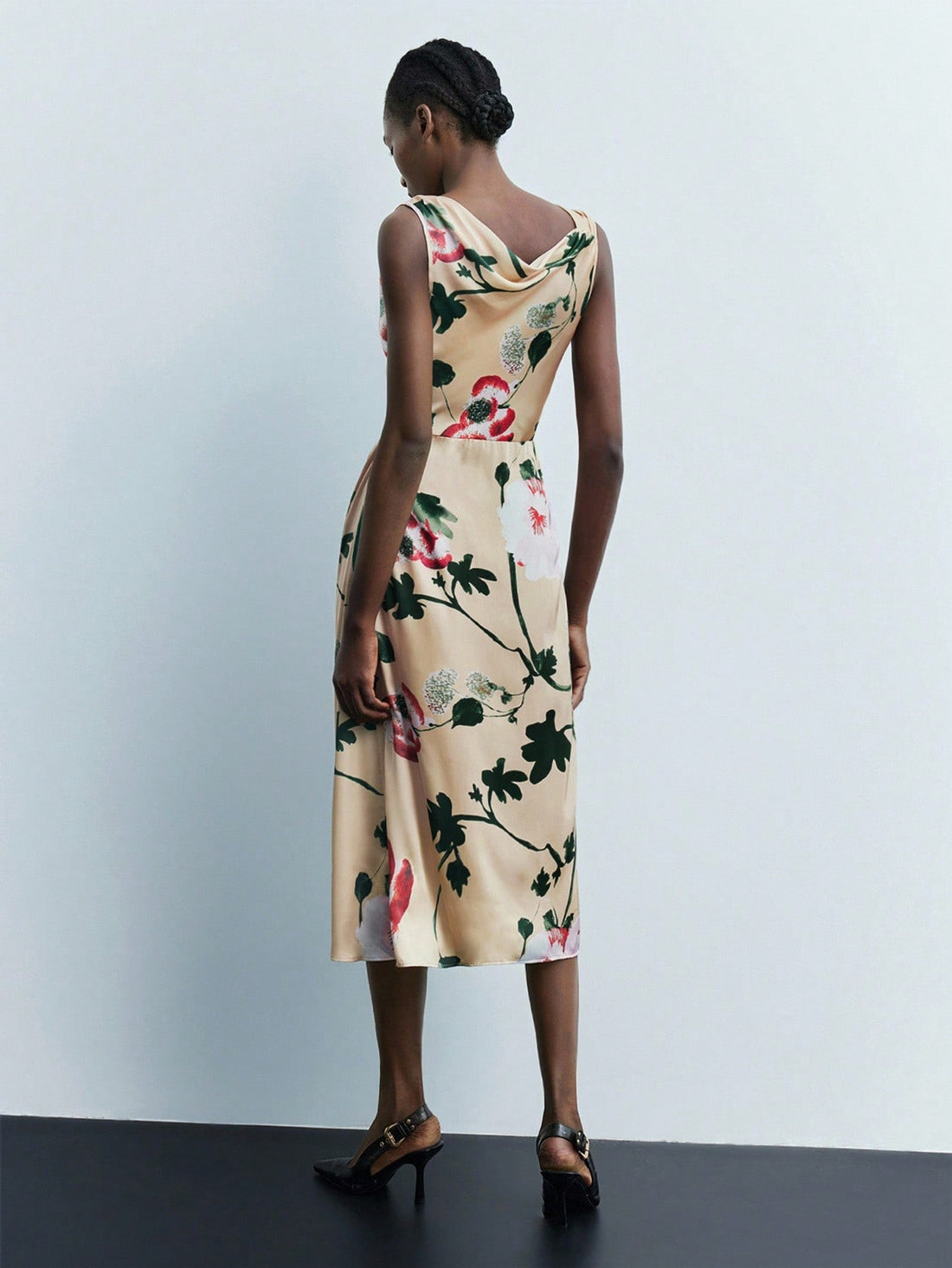 Stay cool and charming in this chic sleeveless mini dress, adorned with playful ruffles and a vibrant floral print. Perfect for sunny days, its breezy design lets you move freely while adding a flirty touch to your summer wardrobe. Whether you're out for brunch or a casual stroll, this dress delivers effortless style with a fun, fresh vibe.