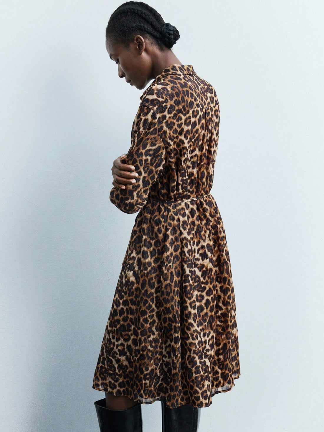Step out in style with this trendy leopard print shirt dress, perfect for turning heads during your daily commute or casual outings. Its playful pattern adds a wild touch to your wardrobe, while the comfortable fit lets you move freely from morning meetings to weekend brunches. Embrace boldness with an easygoing vibe!
