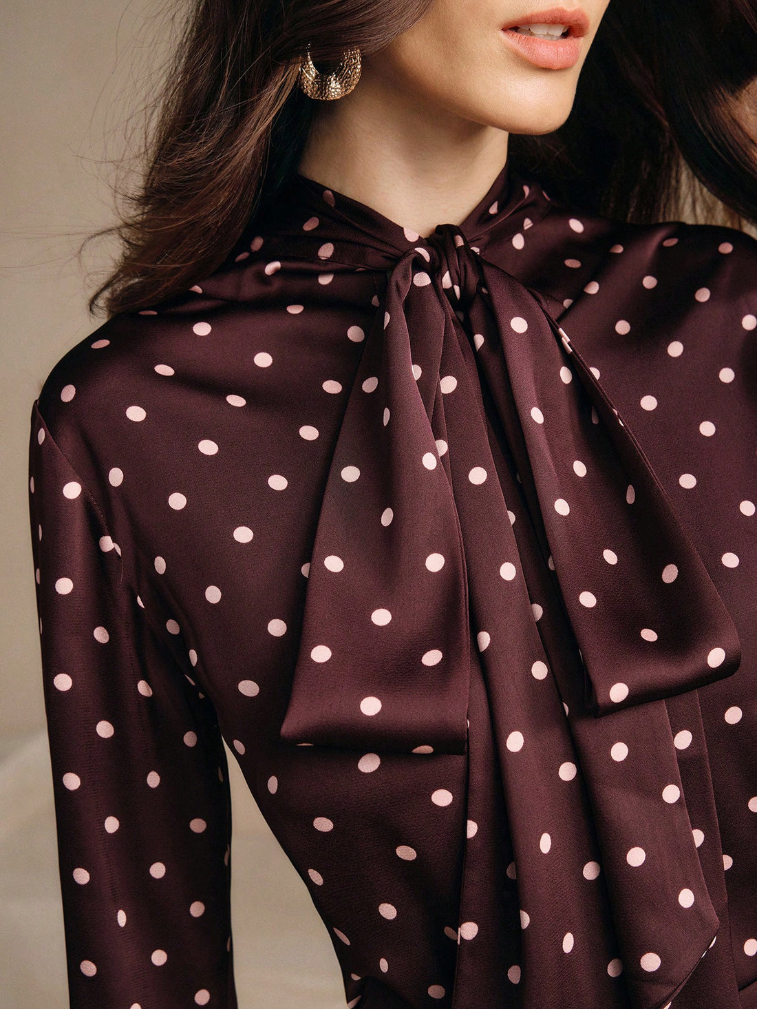 Escape to effortless style with this charming 2-piece set that screams vacation vibes. The brown and pink polka dot shirt pairs perfectly with a flattering high-waist skirt, creating an instantly put-together look that works from brunch to sunset strolls. Whether you're planning a getaway or just dreaming of one, this spring-summer essential brings that breezy, carefree energy to your everyday wardrobe. Mix, match, or wear together—either way, you'll feel like you're on holiday.