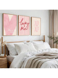 Close-up of white motivational lettering with playful star and heart accents