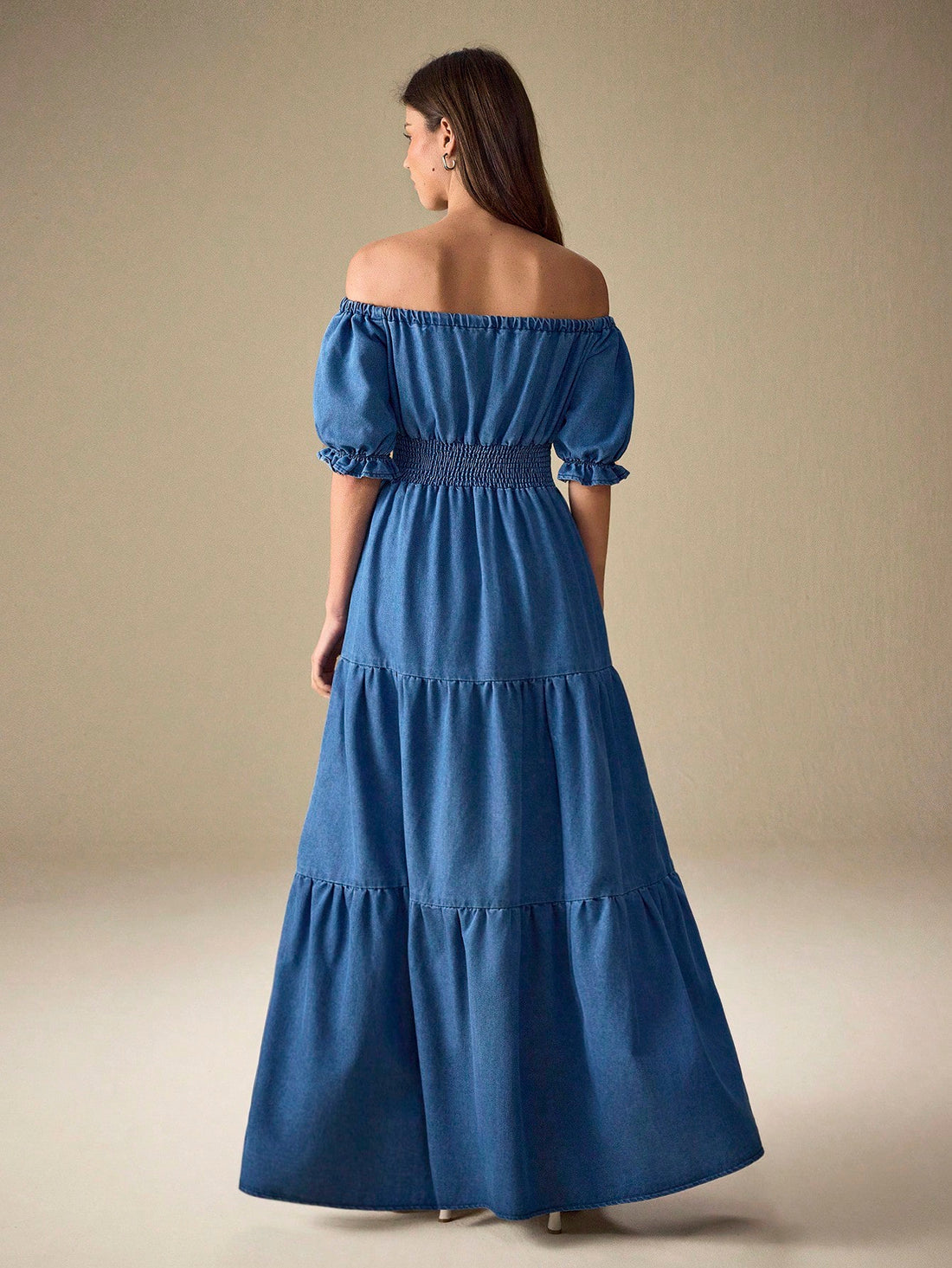 Effortlessly chic and oh-so-fun, this denim dress is your new go-to for turning heads. The off-shoulder neckline shows just the right amount of skin, while adorable puff sleeves add a flirty touch that screams modern style. The gathered waist cinches you in all the right places, creating a flattering silhouette that works for brunch, dates, or casual outings. Crafted from classic denim, it's durable enough for everyday wear yet stylish enough to feel special. Dress it up with heels or keep it casual with sn
