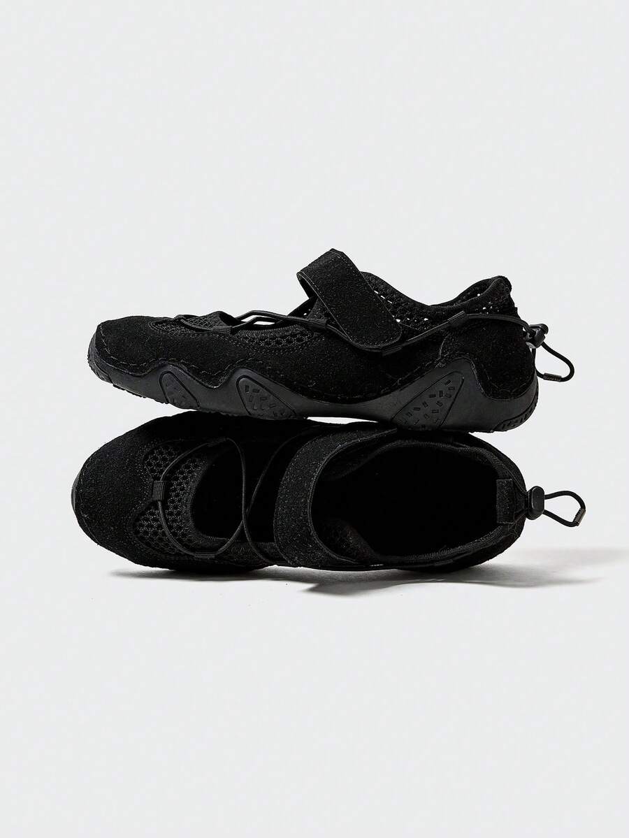 Stacked side-top view of black adjustable mesh water shoes with rounded toes