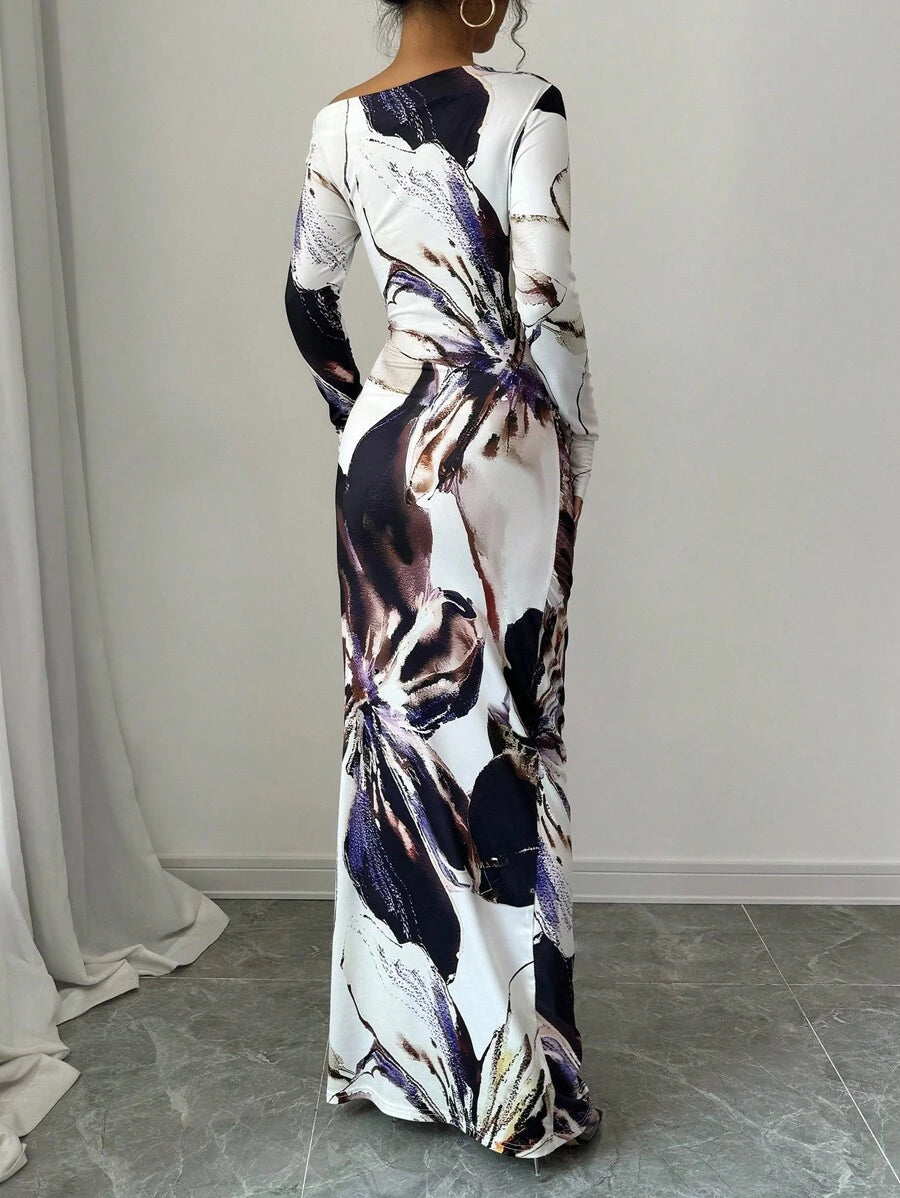 Elevate your fall wardrobe with this stunning maxi dress that's equal parts sophisticated and fun. The eye-catching print brings personality to every occasion, while the asymmetric neckline adds an unexpected twist that keeps things interesting. Long sleeves provide comfort and coverage as temperatures drop, making it perfect for layering or wearing solo. Whether you're heading to brunch, a casual date, or a weekend getaway, this dress effortlessly transitions from day to night. Flowy, flattering, and unden