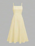 Front View Of Cami Dress in pale yellow with flared midi skirt for wedding and office styling