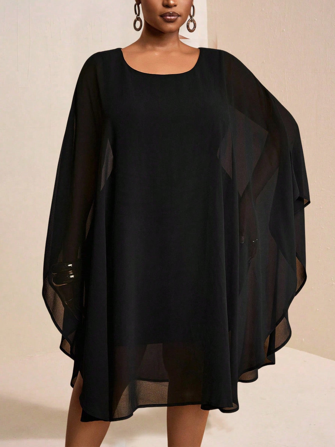 Turn heads effortlessly in this elegant plus size black mini dress, perfect for dates and parties during the Spring/Summer 2025 season. Its flattering fit celebrates your curves while keeping your look chic and playful. Designed to make every moment memorable, this dress blends comfort with style so you can dance the night away with confidence.