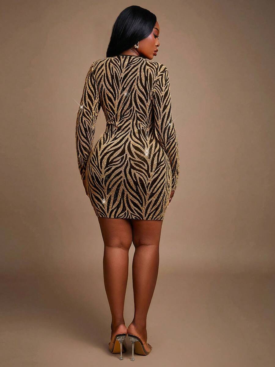 Make a statement in this stunning plus-size party dress that's ready for any celebration! Adorned with shimmering sequin details and eye-catching silver ring embellishments, this dress combines glamour with comfort. The elegant silhouette flatters your curves while the playful sparkle keeps things fun and fabulous. Whether you're heading to a wedding, cocktail party, or night out with friends, you'll feel confident and absolutely radiant. Perfect for anyone who loves a little extra shimmer and wants to shin