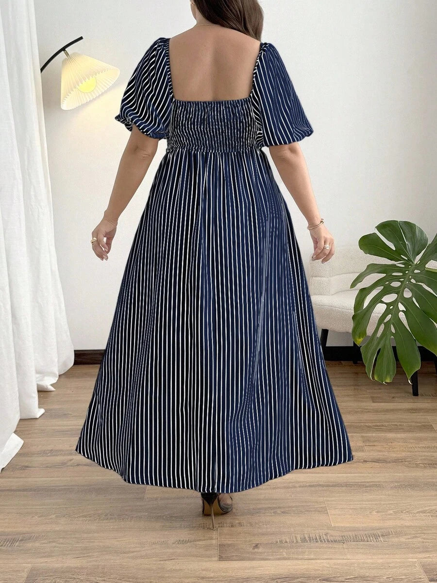 Step out in style and comfort with this Elegant Plus Size Striped Floral Peplum Jumpsuit. Featuring a playful mix of stripes and floral patterns, this jumpsuit embraces your curves with a flattering peplum waist and breezy short sleeves. Perfect for turning heads at brunch or a casual night out, it combines fashion and ease in one chic package.