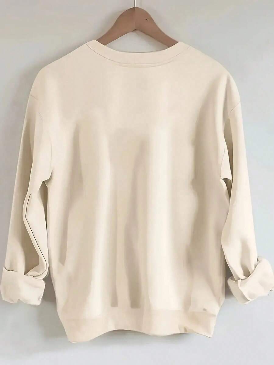 Detail view of Monet-Inspired Soft Beige Sweatshirt: Casual Art-Printed Pullover for All Seasons for everyday styling
