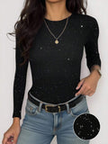 Front worn view of black fitted long-sleeve T-shirt with white and grey starfield print