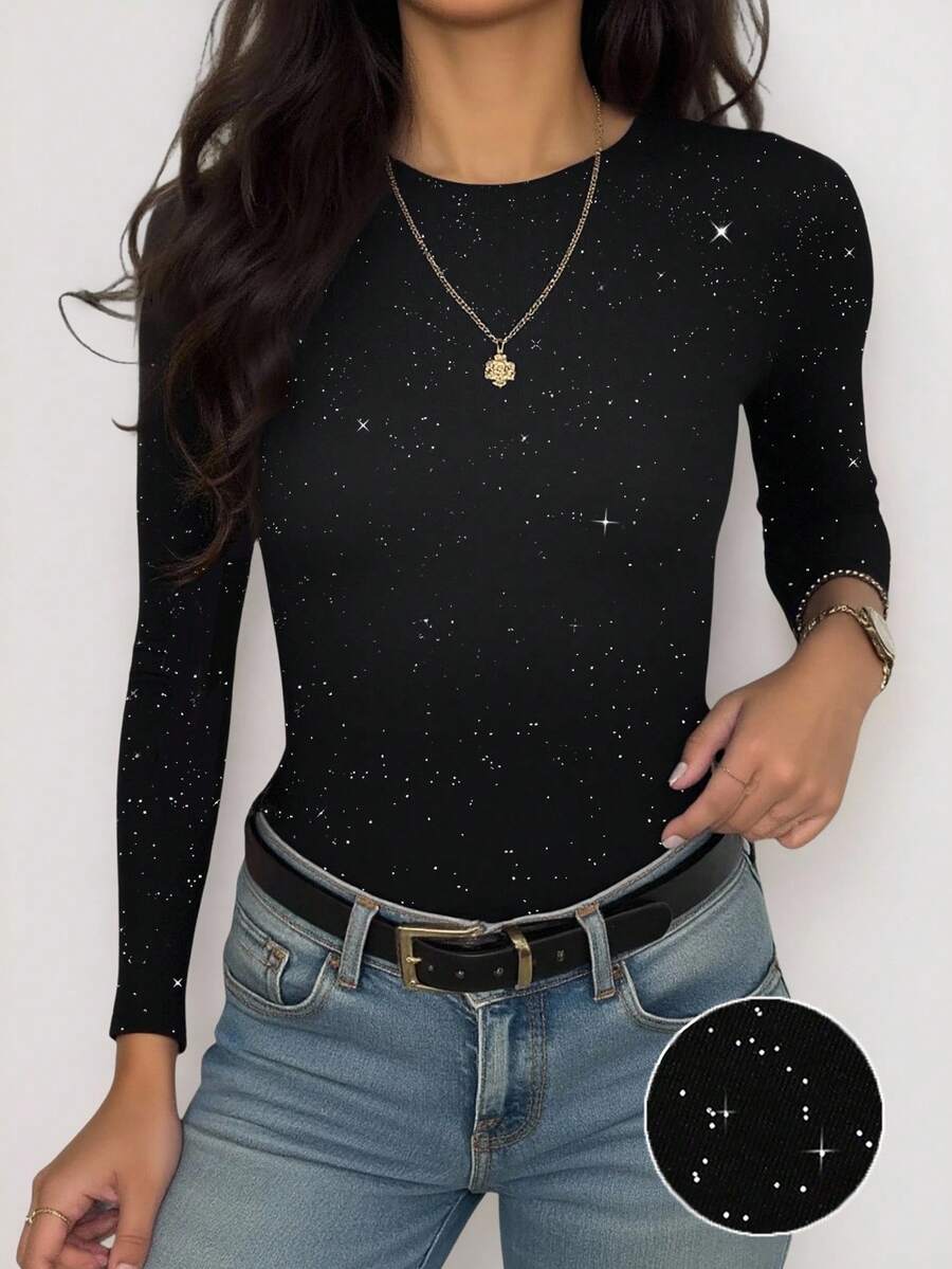 Front worn view of black fitted long-sleeve T-shirt with white and grey starfield print