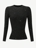 Front product view of black crew-neck top with all-over celestial star print