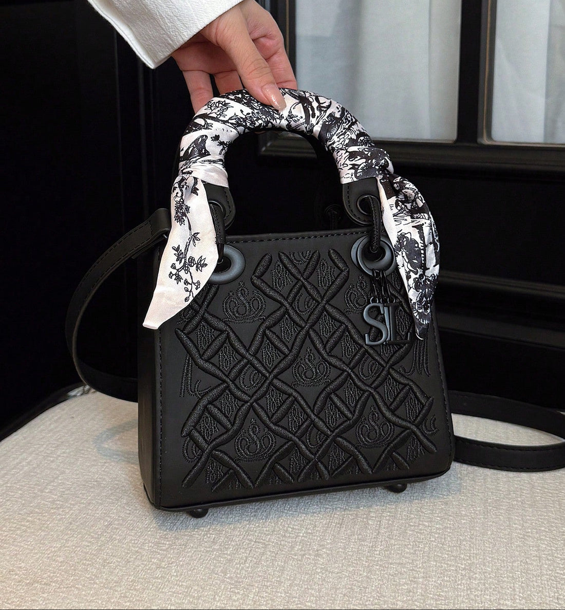 Elevate your everyday carry with this stunning diamond grid handbag—a sophisticated blend of style and practicality. Crafted with meticulous attention to detail, the geometric quilted pattern catches the light beautifully while the spacious interior keeps your essentials organized. Whether you're jet-setting across the globe or navigating your daily adventures, this versatile piece transitions seamlessly from boardroom to brunch. The premium construction ensures durability without compromising on that covet