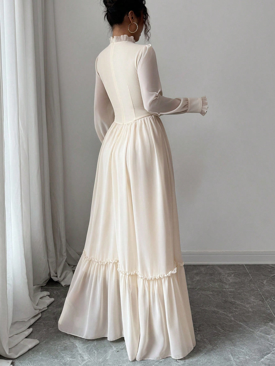 Elevate your autumn wardrobe with this enchanting high-neck lace dress that whispers romance with every twirl. Delicate pearl accents dance across the fabric, while the charming ruffle hem adds a playful flourish to your silhouette. Perfect for date nights, special occasions, or whenever you want to feel absolutely fabulous. This is the dress that makes you feel like the main character in your own love story—sophisticated, graceful, and utterly unforgettable.