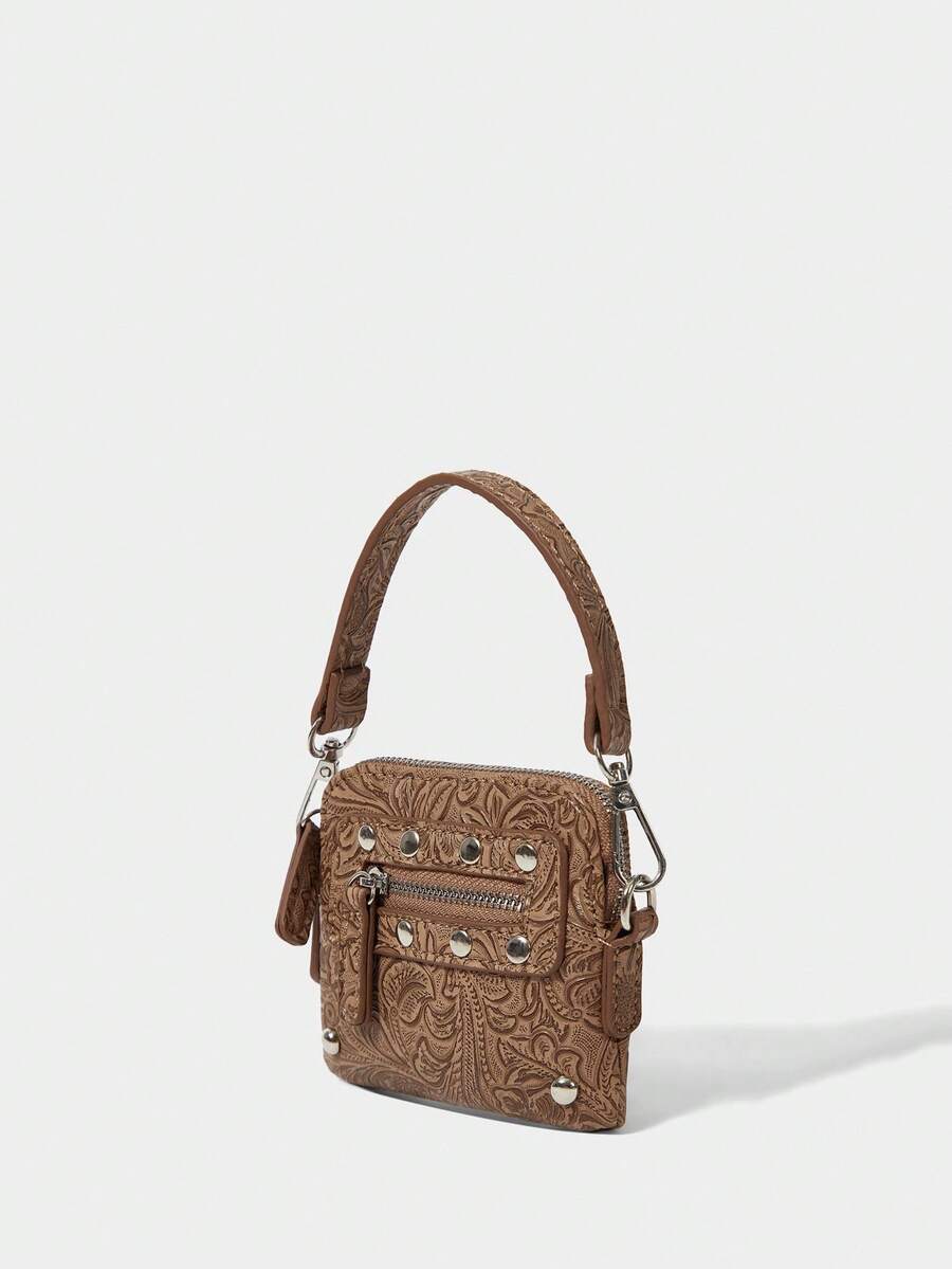 Fashionable mini crossbody bag top handle detail, close-up