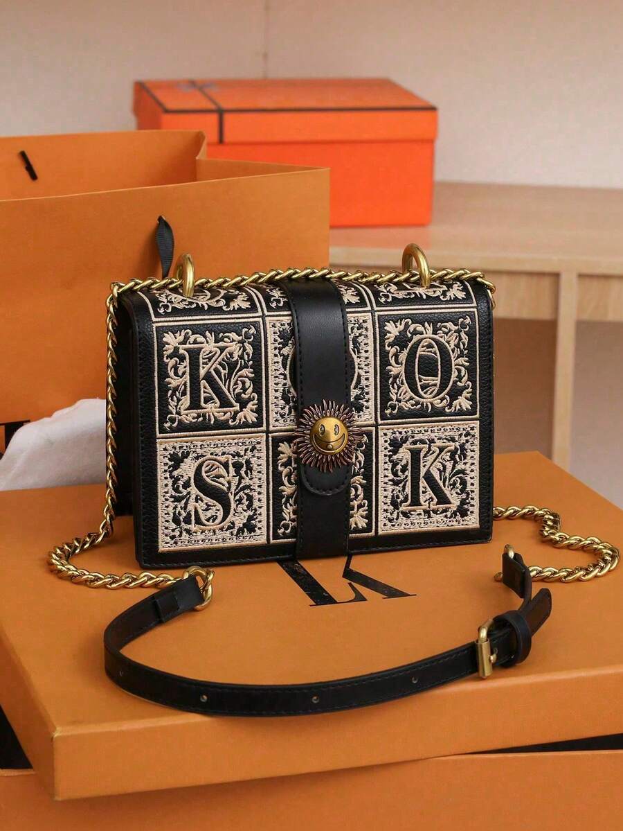 Interior view of black mini crossbody bag with zipper divider