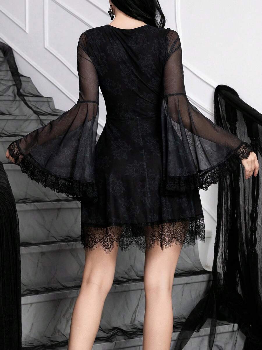 Front view of black gothic rose-print mini dress with sheer flared sleeves and lace hem