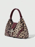 Front view of pink patterned hobo shoulder bag with double handles