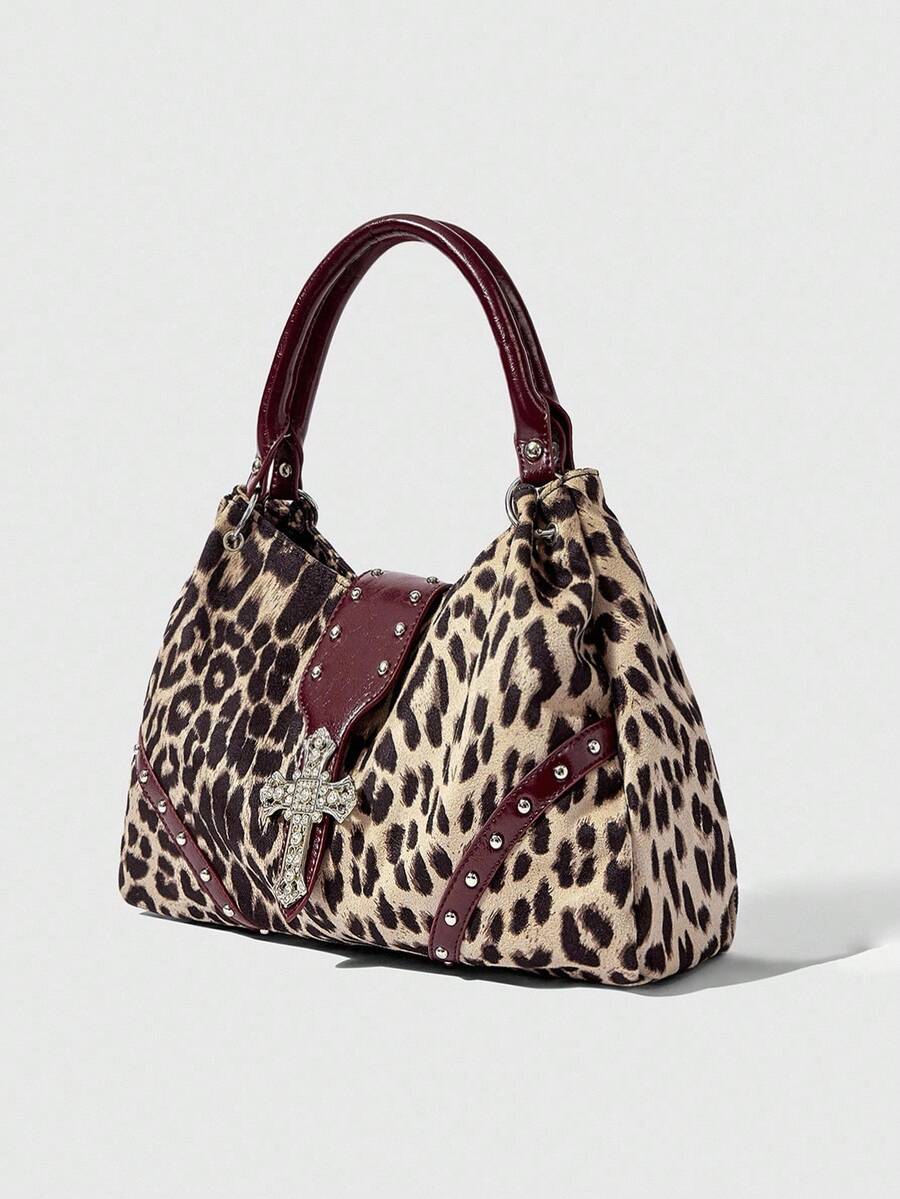 Front view of pink patterned hobo shoulder bag with double handles