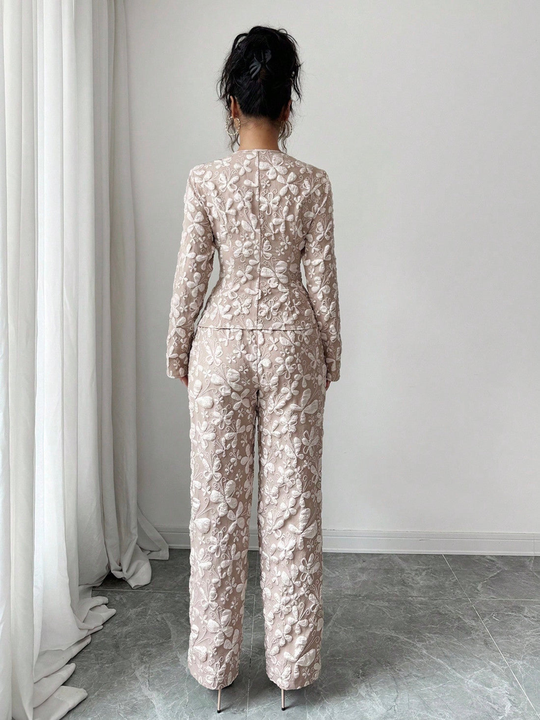 Elevate your wardrobe with this stunning jacquard long sleeve v-neck shirt set—where timeless elegance meets modern flair. Crafted with intricate jacquard detailing, this sophisticated piece features a flattering v-neckline and luxurious long sleeves perfect for layering or wearing solo. The refined texture adds visual interest to any outfit, making it ideal for both professional settings and elevated casual wear. Versatile, chic, and undeniably stylish, this set is your go-to for looking polished without t