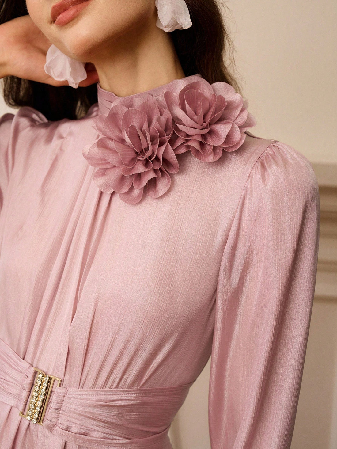 Turn heads in this playful long sleeve dress featuring charming 3D floral accents that add a touch of whimsy to your look. The delicate pleated design brings movement and flair, making it perfect for twirling through any occasion. Comfortable and stylish, this dress effortlessly blends elegance with fun flair.