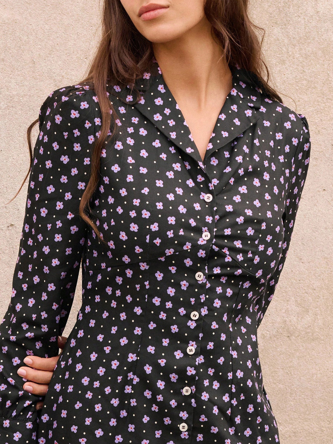 Elevate your workweek wardrobe with this charming purple ditsy floral midi shirt dress—a versatile piece that effortlessly transitions from office to weekend plans. The classic shirt dress silhouette pairs perfectly with blazers for polished meetings or stands beautifully on its own for a more relaxed vibe. Delicate floral prints add personality without overwhelming your look, while the midi length keeps things professional and on-trend. Whether you're layering it over a turtleneck for chilly mornings or pa