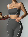 seamless strapless bandeau crop top and high waist leggings activewear set with white contour piping image 3