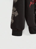 Close view of black hoodie ribbed cuff and cross graphic sleeve detail