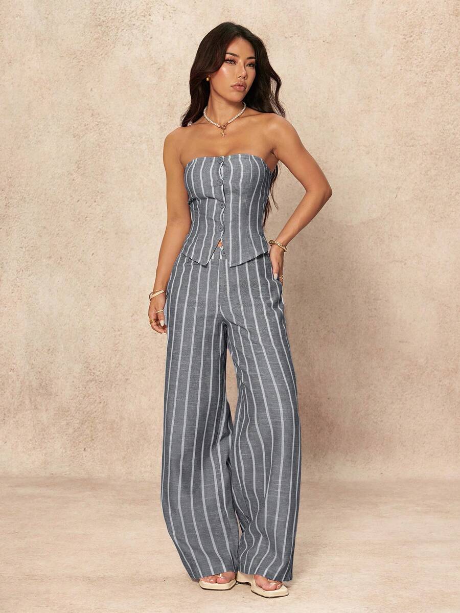 Elevate your everyday style with this chic blue and white striped set. The bandeau camisole features a sleek crop silhouette with button-front detailing, while the wide-leg pants offer a flattering extra-long cut with functional pockets. Crafted from a breathable polyester-cotton blend, this versatile pairing transitions seamlessly from office to casual outings. Perfect for creating effortless, polished looks that work year-round.