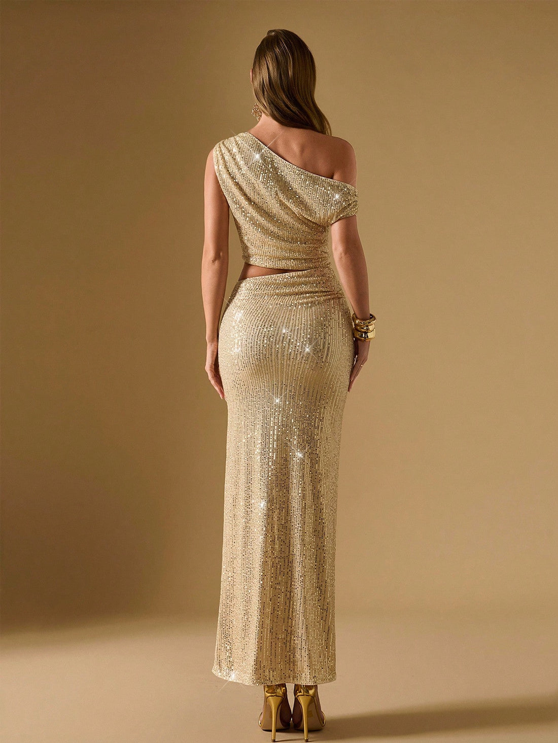 Slip into pure glamour with this stunning gold sequin dress that's ready to turn heads at any soirée. The asymmetrical shoulder design adds a modern twist to timeless elegance, while shimmering sequins catch the light with every move. Perfect for cocktail parties, galas, or nights when you want to feel absolutely fabulous. This luxury piece combines sophisticated silhouette with eye-catching sparkle—because sometimes you need to shine a little brighter than the rest.