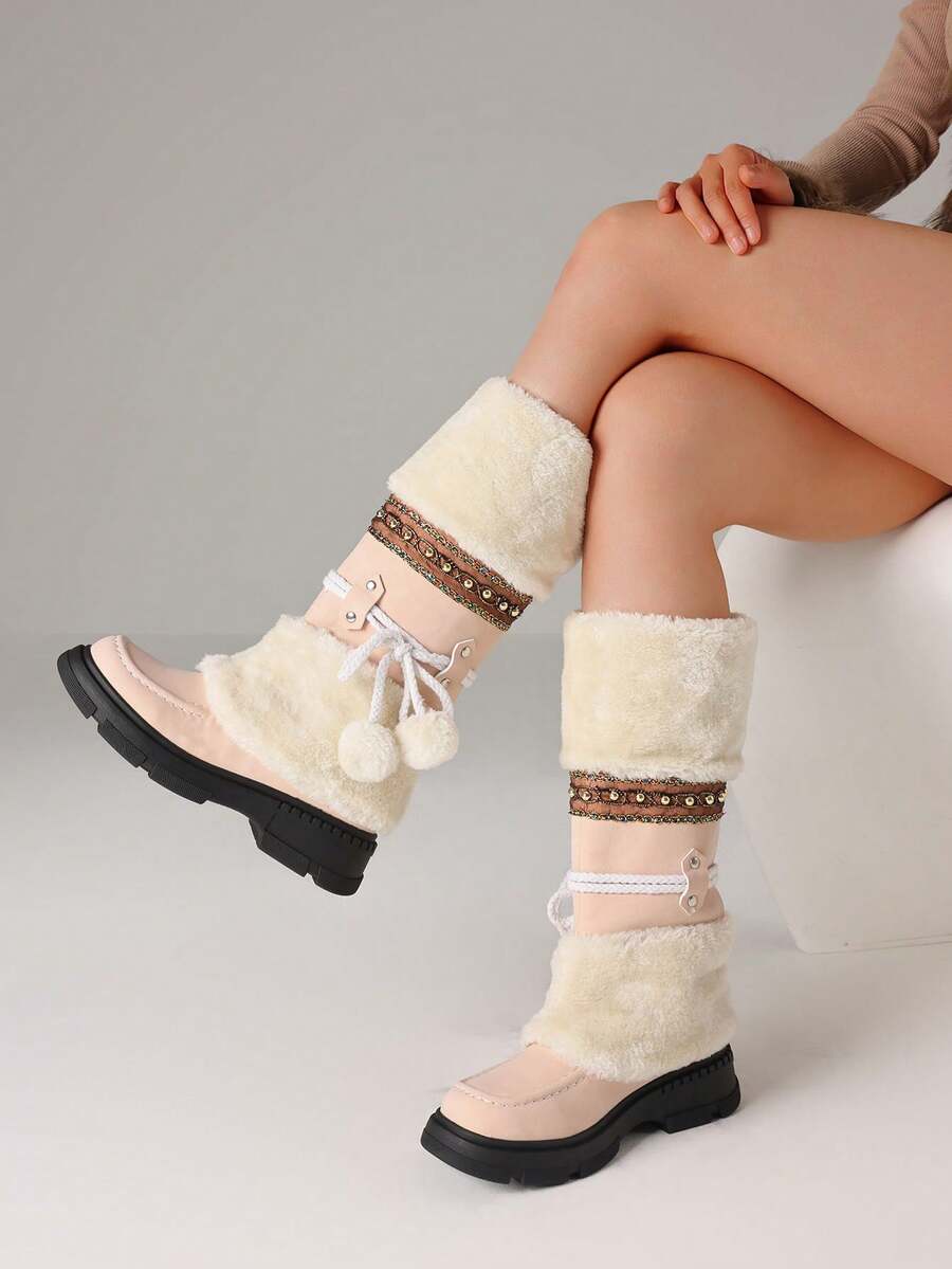 Step into winter with serious style! These knee-high snow boots combine cozy faux fur lining with a sturdy chunky heel for the perfect blend of warmth and fashion-forward flair. Whether you're trudging through snow or hitting the town, these beauties keep your feet toasty while turning heads. The plush interior wraps your feet in comfort, while the bold heel adds an instant confidence boost to any cold-weather outfit. Say goodbye to choosing between looking good and staying warm—these boots do both!