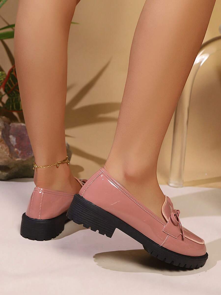 Step into effortless style with these chic solid color women’s loafers, accented by a charming bow detail. Perfect for school days or casual outings, they blend comfort with a playful touch, making every step a little more fun and fabulous.