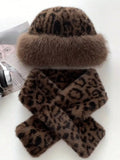 Flat lay of matching brown leopard faux-fur hat and long scarf