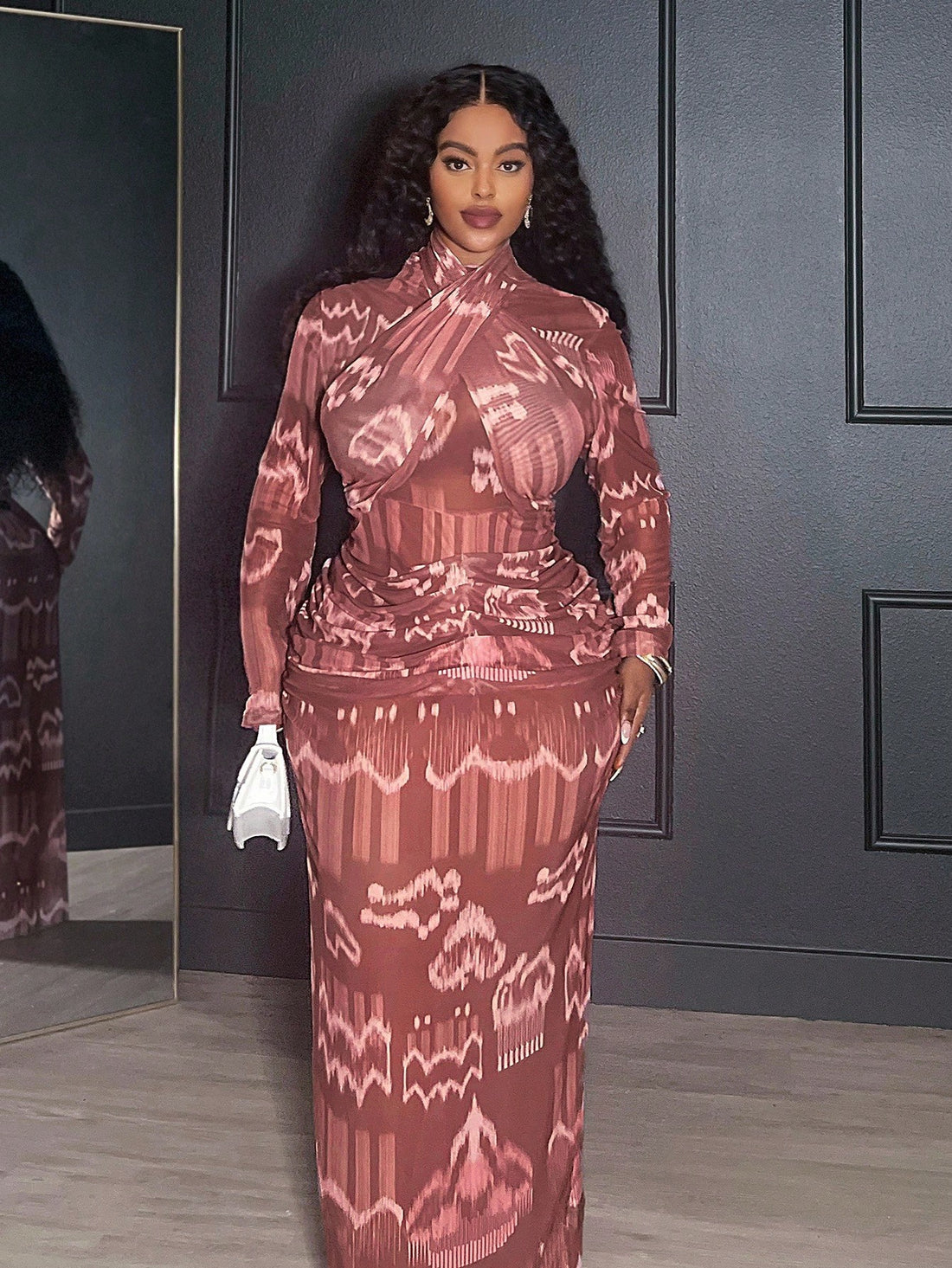 Turn heads effortlessly with this Elegant Plus-Size Maxi Dress, designed to celebrate your curves with a flattering fitted silhouette. The long sleeves and V-neck add a touch of sophistication, while the abstract mesh print brings a playful, modern edge. Perfectly suited for date nights, parties, or graduations, this dress ensures you feel confident and radiant wherever you go. Step out in style and make every special occasion unforgettable!