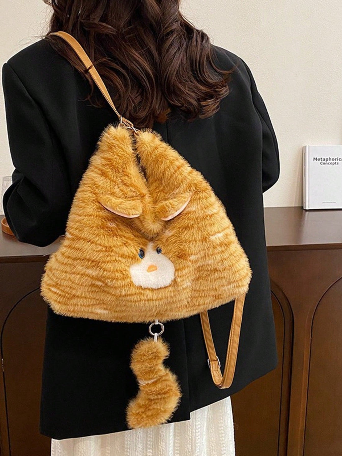 Carry your essentials with a twist of fun using the Style Plush Cat Underarm Bag! This cozy winter backpack keeps your belongings safe while adding a playful charm to your daily commute. Its spacious interior offers plenty of room for your must-haves, making it the perfect companion for busy days. Stay warm, stylish, and cute all season long with this delightful cat-inspired bag.