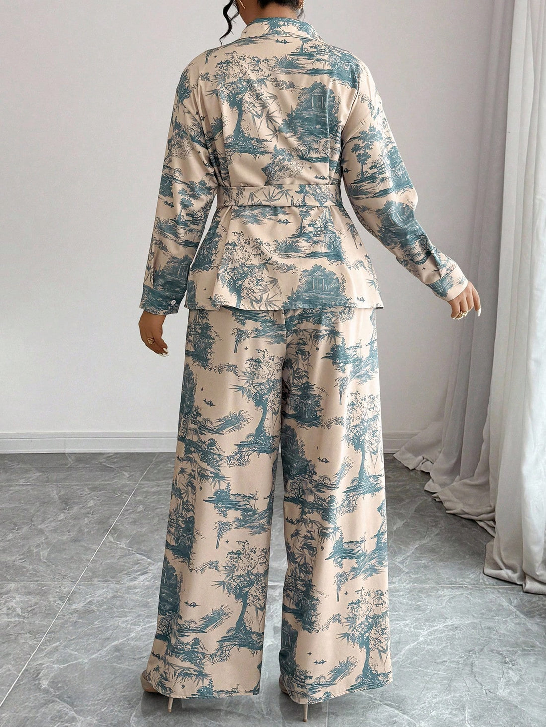 Embrace your botanical side with this effortlessly chic two-piece set! The long sleeve shirt features a vibrant plant print that brings nature-inspired style to your everyday wardrobe, while the wide-leg pants offer a flattering, comfortable silhouette that moves with you. Perfect for those who love making a statement without sacrificing comfort, this set combines trendy design with plus-size inclusivity. Mix, match, or wear together—either way, you're serving looks that celebrate your unique style and pers