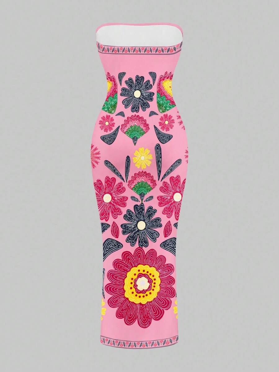 Pink strapless floral bodycon maxi dress styled indoors with clear heels