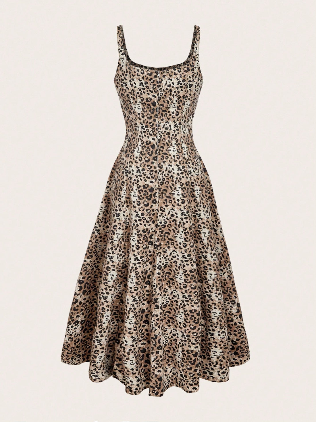 Make a bold statement this season with our Women's Leopard Print Square Neck Sleeveless Denim Dress. This playful piece combines classic denim with eye-catching leopard print for an effortlessly chic look. The flattering square neckline and sleeveless design offer versatile styling options—dress it up with heels or keep it casual with sneakers. Perfect for layering through autumn and winter, this trendy dress brings that perfect mix of edge and elegance to your wardrobe. Whether you're heading to brunch or 