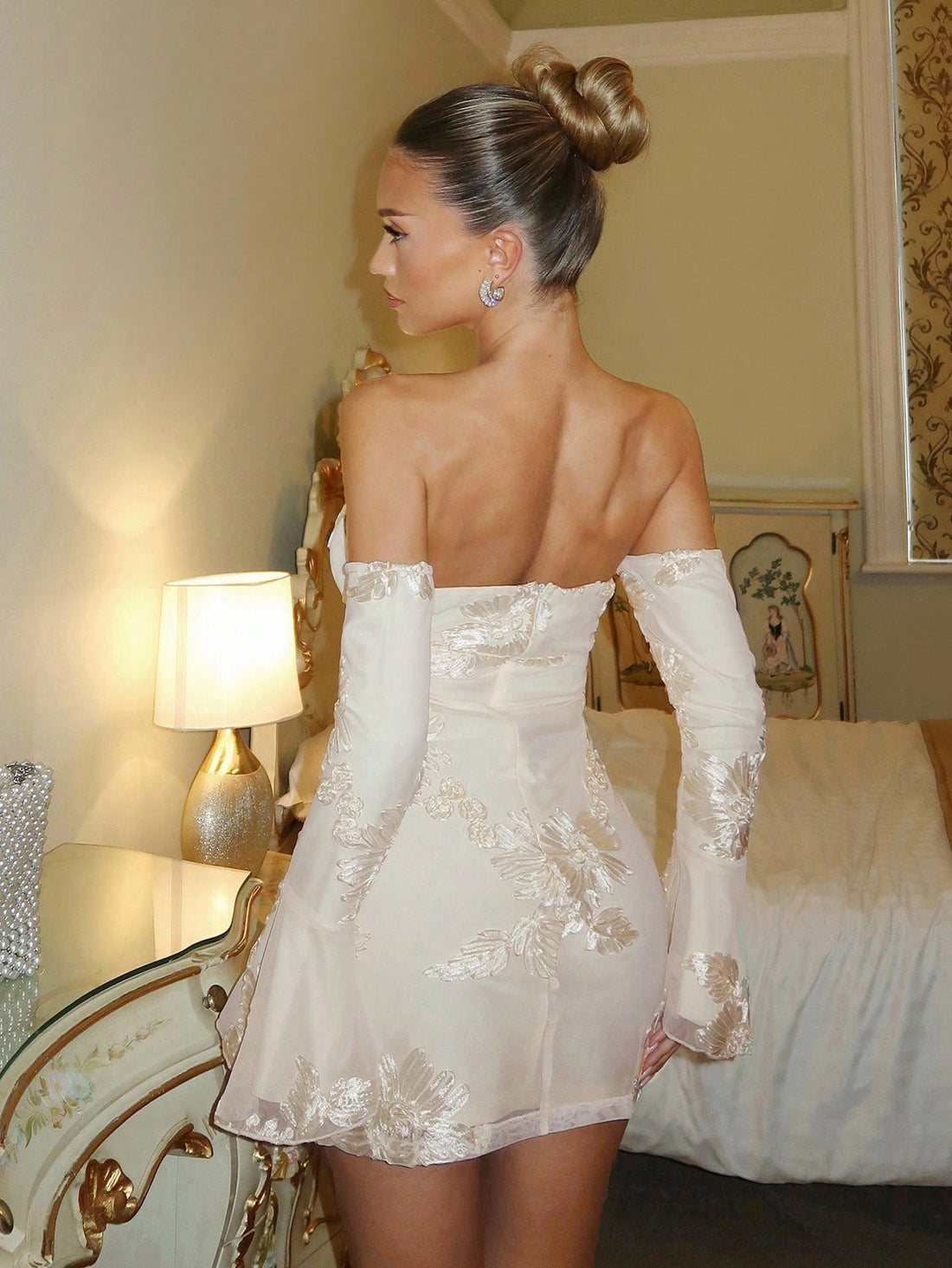 Elevate your party look with this stunning floral embroidered tube top mini dress! The delicate floral details add a touch of romance, while the flattering tube neckline and playful bell sleeves create an effortlessly chic silhouette. Perfect for cocktail nights, celebrations, or any occasion where you want to turn heads. The mini length keeps things fun and flirty, making it an instant favorite for those who love feminine style with personality. Slip it on and get ready for compliments!