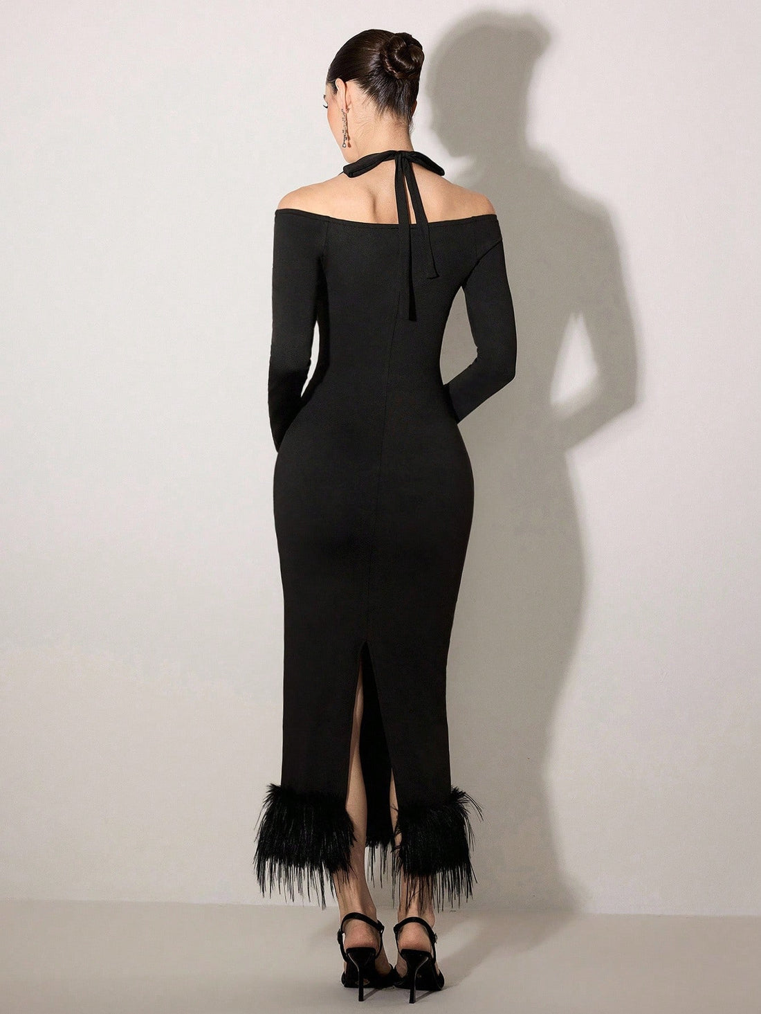 Effortless sophistication meets playful style with this minimalist halter tie midi dress. The clean solid color and sleek silhouette make it your go-to piece for casual outings or dressed-up occasions. The halter neckline adds a touch of flirtation while the midi length keeps things chic and timeless. Pair it with sneakers for weekend vibes or elevate it with heels for evening plans. Simple, stunning, and endlessly versatile—this dress does the heavy lifting so you don't have to.