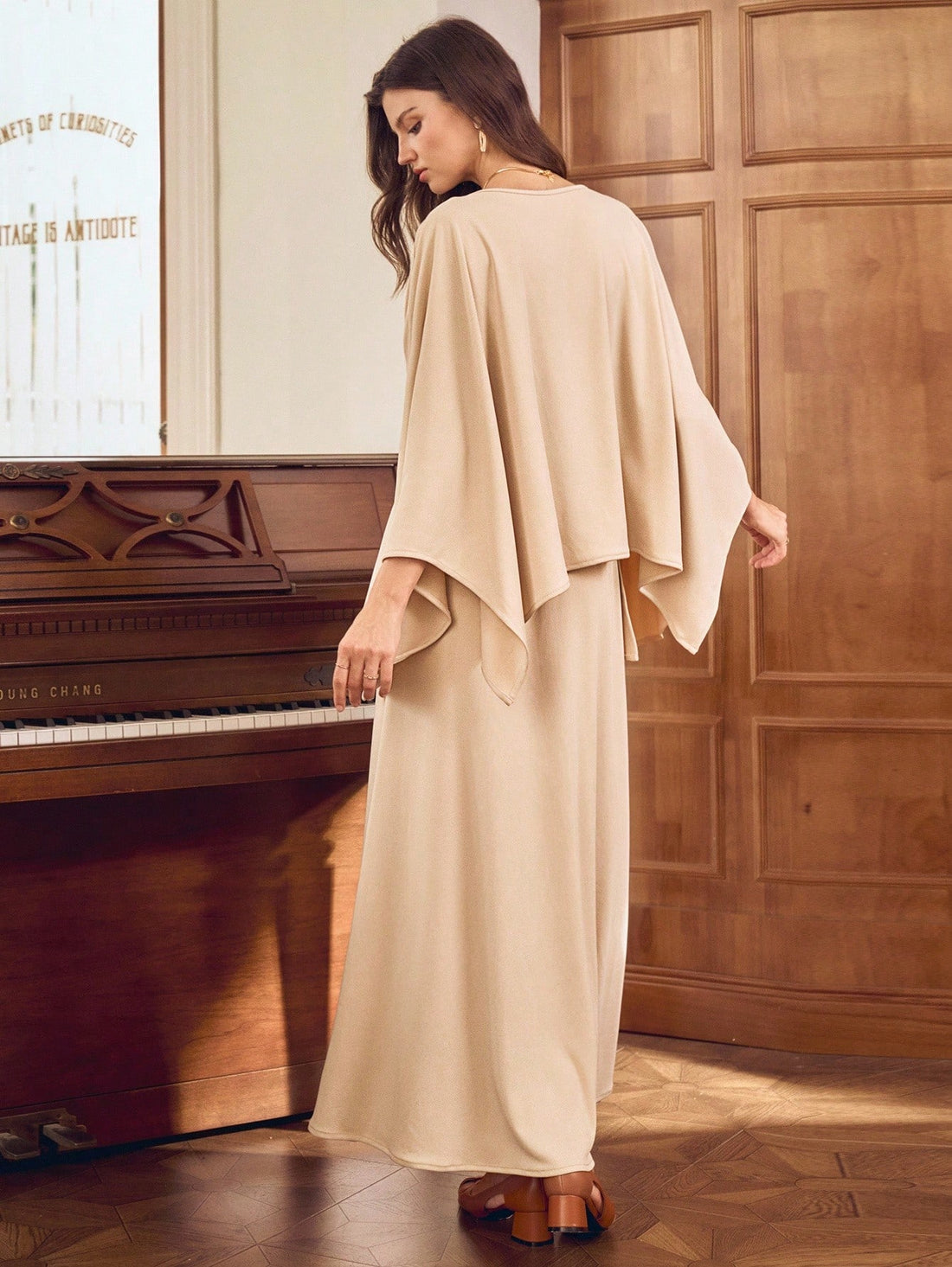 Unleash your inner fashionista with our Chic Women's Asymmetrical 2-Piece Poncho Set! This set features trendy flare sleeves and a stylish round neck, perfect for any occasion. Stay stylish and comfortable with this unique and versatile ensemble. (No need to sacrifice style for comfort here!)