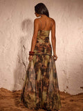 Close view of tie-dye mesh corset bodice and ruched skirt detail