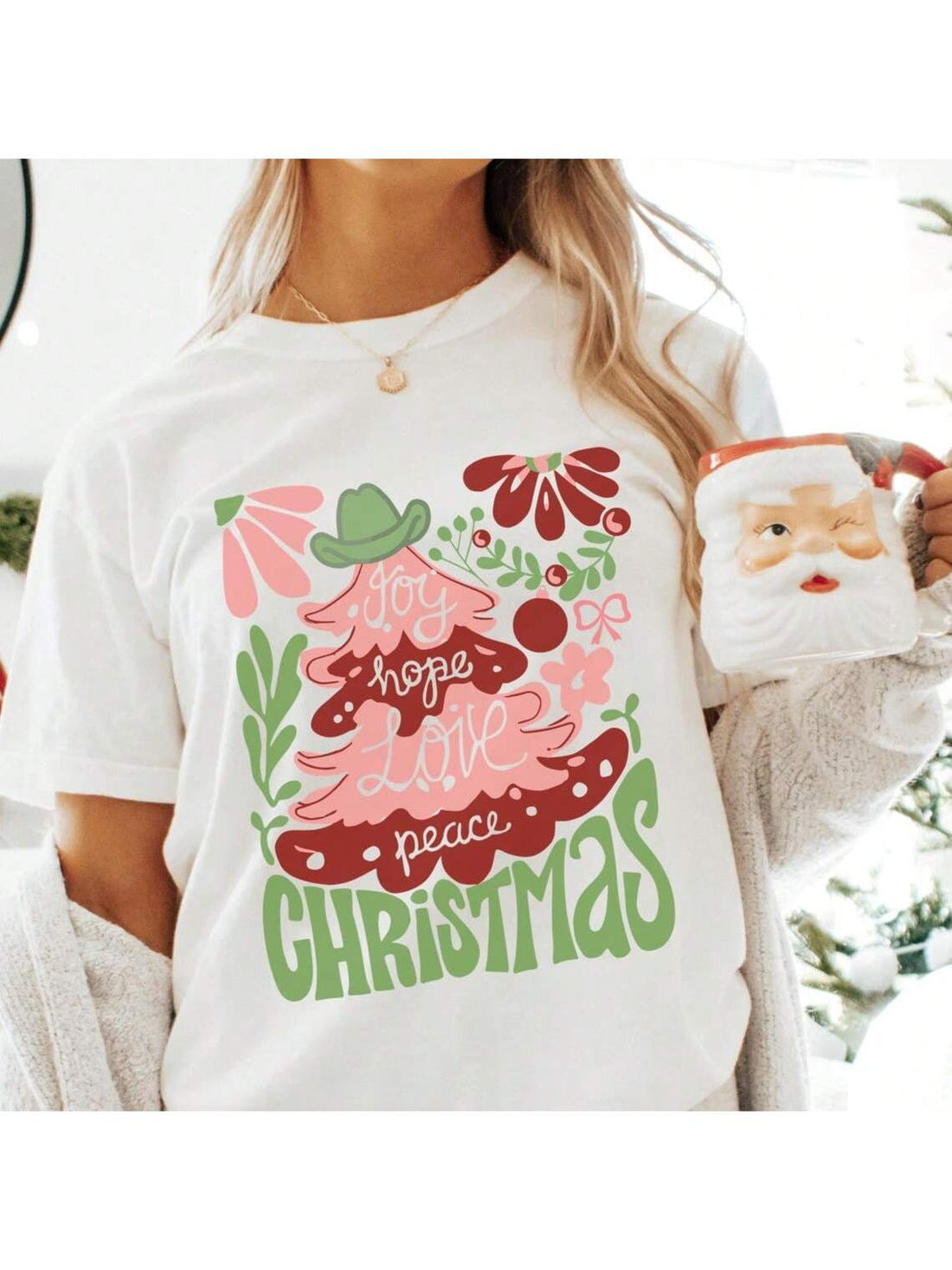 Get ready to jingle all the way with this Festive Western Holiday Tee! Featuring a fun cowboy Christmas design, it’s perfect for merry celebrations and spreading holiday cheer with a western twist. Whether you’re around the fire or dancing at the party, this tee brings playful charm to your festive wardrobe. Saddle up for holiday fun in style!