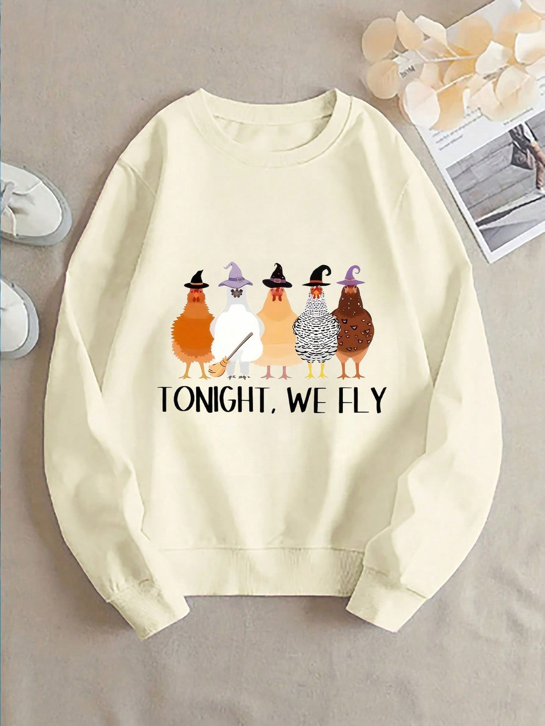 Embrace the spirit of fall with this Stylish Women's Halloween Printed Crew Sweatshirt. Crafted from soft, breathable fabric, it ensures all-day comfort while celebrating the season. Its eye-catching Halloween design adds festive charm, making it an ideal choice for autumn gatherings and casual outings. Durable and cozy, this sweatshirt combines style and comfort for a perfect seasonal wardrobe staple.