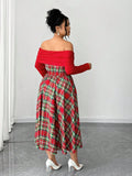 Back three-quarter view of red tartan A-line midi dress with long sleeves