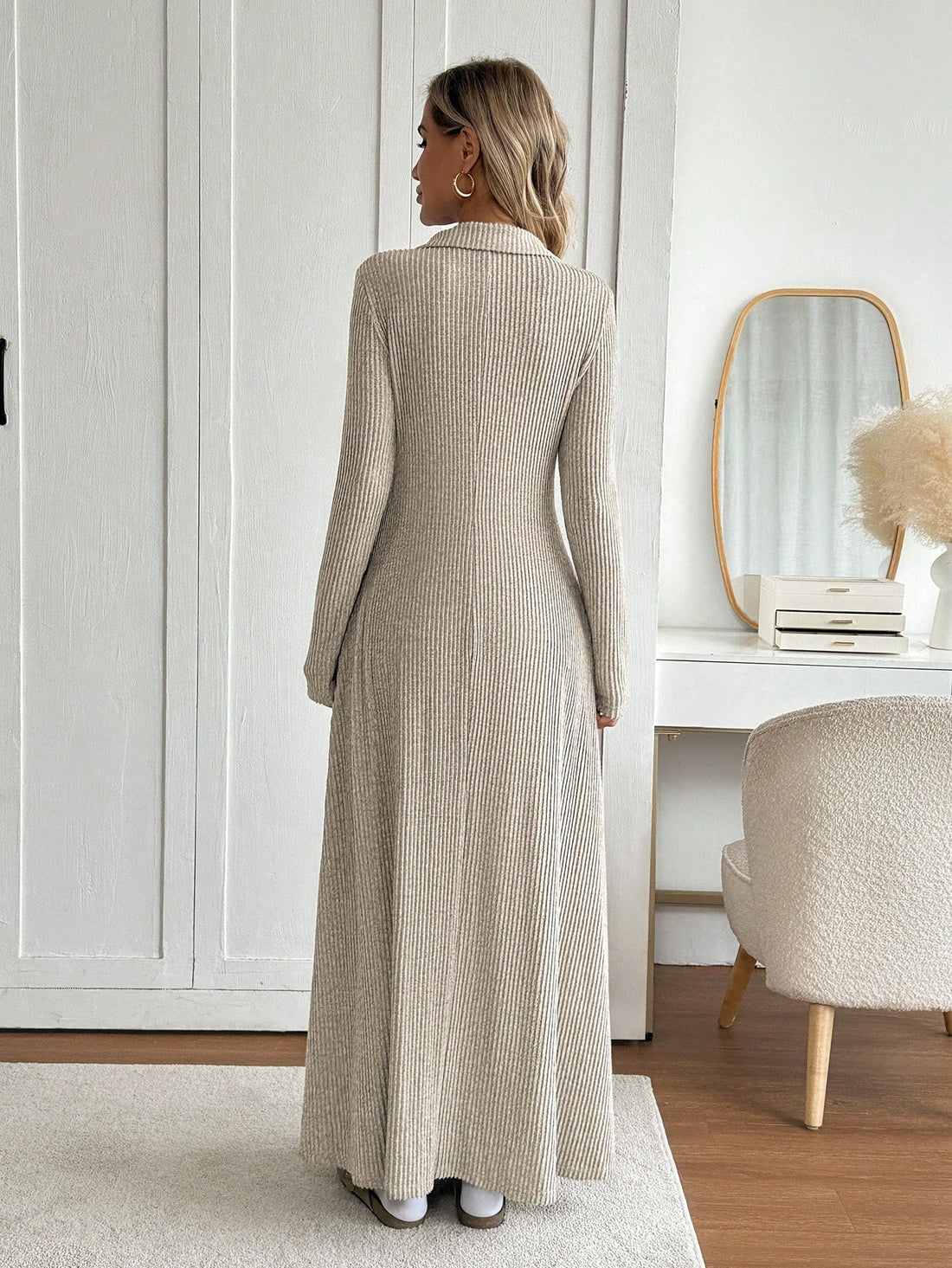 Slip into timeless elegance with this vintage-inspired beige knit maxi dress—your new go-to for cozy autumn and winter days. The crisp collared neckline adds a touch of sophistication, while the graceful flared hem creates a flattering silhouette that moves beautifully. Crafted from soft, warm knit fabric, it's the perfect piece for layering or wearing solo. Whether you're heading to brunch, a casual dinner, or just want to feel put-together while staying comfortable, this dress delivers effortless style th