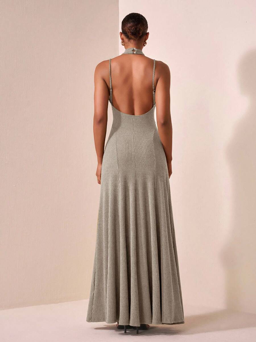 Step into autumn with this playful military green sleeveless umbrella skirt dress, designed to turn heads at business meetings, beach outings, or lively parties. Its flared skirt adds a fun, twirling flair, while the sleeveless cut keeps you cool and comfortable. Versatile and stylish, this dress effortlessly blends elegance with a touch of whimsy for any occasion.