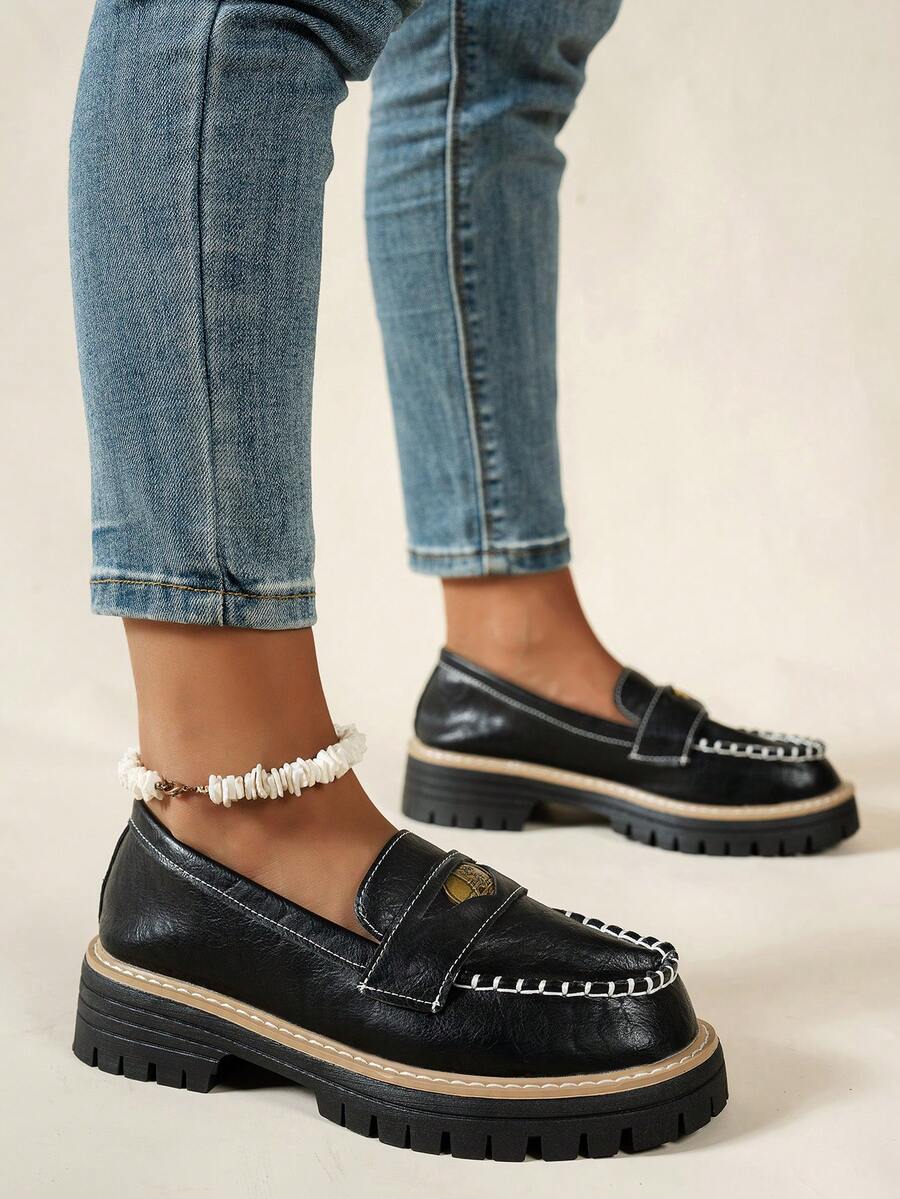 These Retro British Style Brown Penny Loafers combine classic design with modern comfort. Crafted with a durable thick sole, these slip-on flats offer reliable support for all-day wear, whether at the office or casual outings. Their timeless brown finish and penny loafer silhouette bring a sophisticated edge to your wardrobe, blending effortlessly with both formal and relaxed styles. Ideal for women seeking a blend of tradition, style, and practicality.