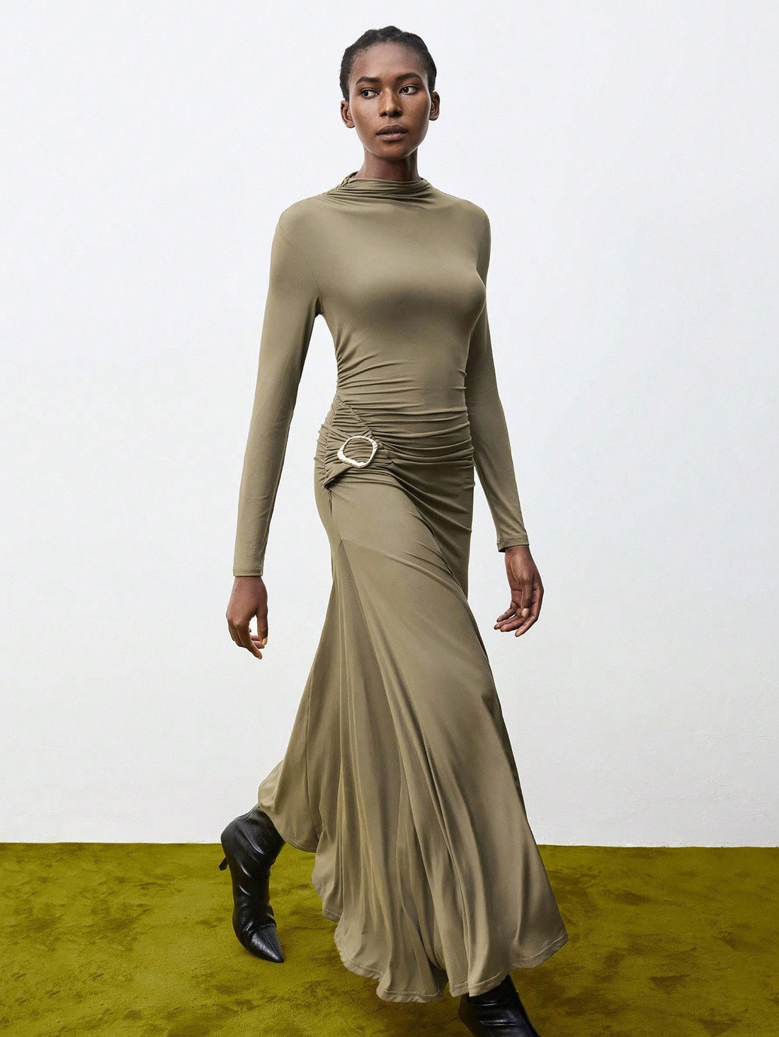 Step out in style with this playful yet elegant long sleeve dress. Featuring a chic pleated design and a fishtail hem that adds a flirty twist to your look, this solid color piece is perfect for any occasion. Its flowing silhouette moves gracefully with you, blending comfort and charm effortlessly. Whether it’s a casual day out or a special evening, this dress promises to bring out your fun and fashionable side.